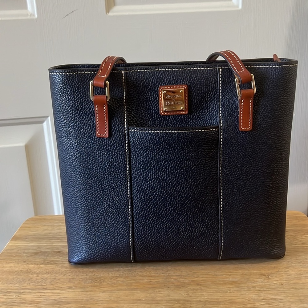 New with tag Dooney and Bourke Mini Lexington hand bag in Midnight Blue Color.